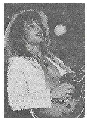 Chicago / Donnie Dacus On Stage-Smiling-Guitar | Magazine Photo