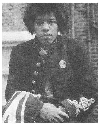 Hendrix, Jimi / Near Brick Building | Magazine Photo