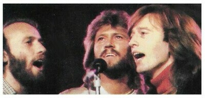 Bee Gees / On Stage-Barry in Center-Dark Background | Magazine Photo | 1979