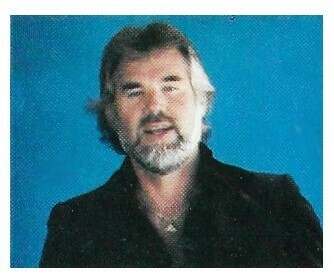 Rogers, Kenny / Black Jacket-Blue Background | Magazine Photo | 1979