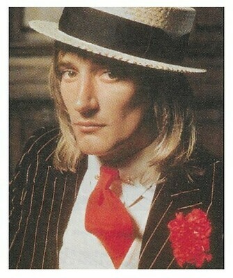 Stewart, Rod / Wearing Boater Hat-Striped Suit-Red Tie | Magazine Photo | 1976