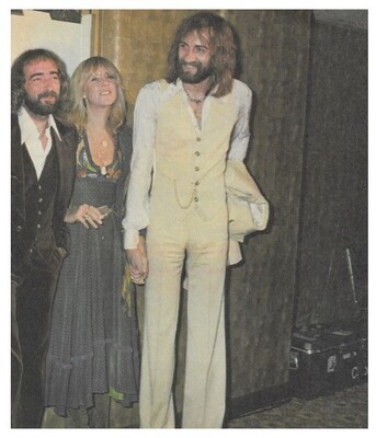 Fleetwood Mac / John McVie-Christine McVie-Mick Fleetwood Standing-Christine with Cigarette | June 1977