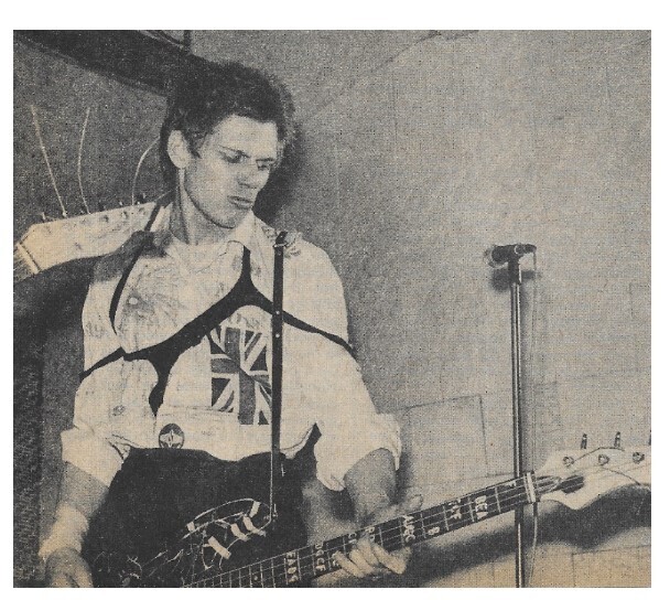 Clash, The / Paul Simonon On Stage, Mauling His Bass Guitar | March 1977