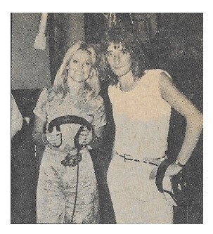 Stewart, Rod / With Britt Ekland, Both Holding Headphones (1976)