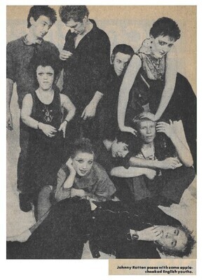 Sex Pistols / Johnny Rotten Poses with Some Apple-Cheeked English Youths | March 1977