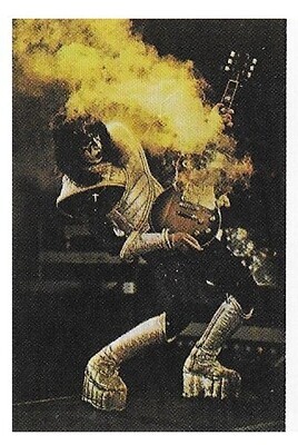 Kiss / Ace Frehley On Stage, Smoking Guitar | Magazine Photo