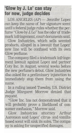 Lopez, Jennifer / Glow by J. Lo Can Stay for Now, Judge Decides | Newspaper Article | December 2002