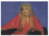 Nicks, Stevie / Dressed in Red Outfit-Blue Background | Magazine Photo