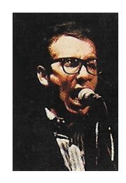Costello, Elvis / On Stage-Closeup-Mouth Open | Magazine Photo | 1970s