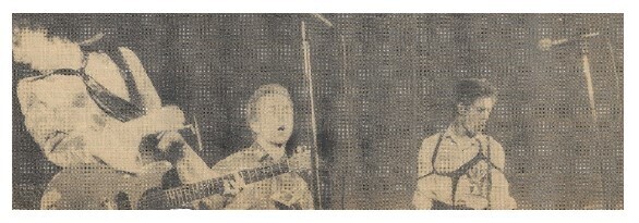 Clash, The / On Stage-Joe Strummer in Center / 1977