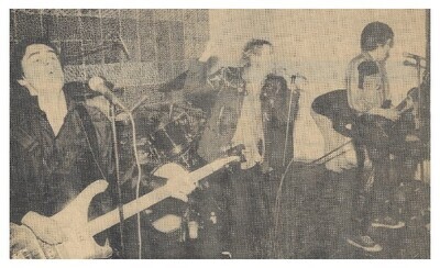 Sex Pistols, The / On Stage-Johnny Rotten in Center / 1976