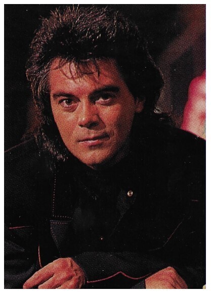 Stuart, Marty / In Dark Blue Jacket-Leaning On Railing | 1994