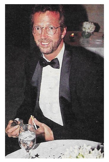 Clapton, Eric / At Table-With Cigarette, Bow-Tie, Suit | November 1992