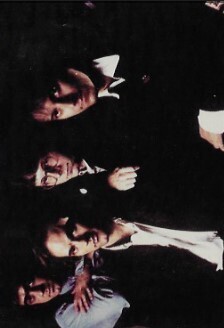 R.E.M. / 1989: Group Photo, Bill Berry in Blue Shirt On Left