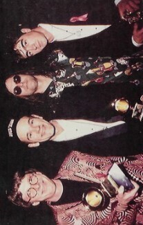 R.E.M. / 1992: At Grammy Awards, Mike and Michael Holding Awards