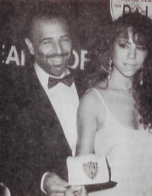 Carey, Mariah / 1991: With Tommy Mottola at the Police Athletic League Dinner in New York