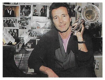 Alpert, Herb / 1989: Sitting at Piano - Trumpet on Shoulder