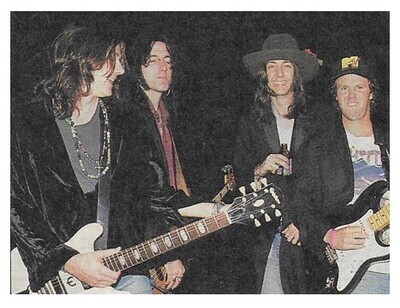 Black Crowes, The / Chris Robinson 2nd from Right-Holding Bottle / 1992