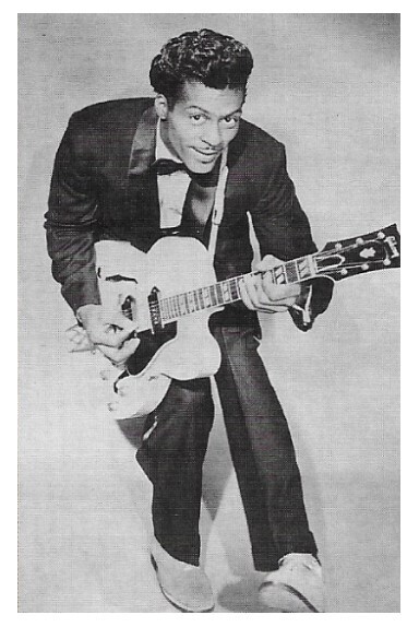 Berry, Chuck / Playing Guitar - Black Suit - Bow Tie / 1958