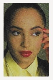 Sade / Closeup-Yellow Shirt-Touching Temple