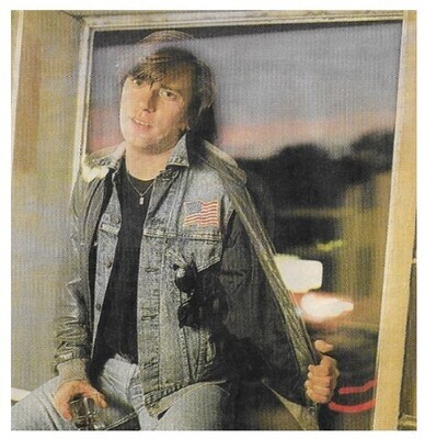 Earle, Steve / 1986: Sitting by Window-Holding Drink