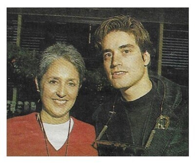 Baez, Joan / 1992: Short Hair-Red-White Top-With Unknown Male