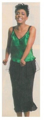 Baker, Anita / Green Top-Black Skirt-Dancing / 1986