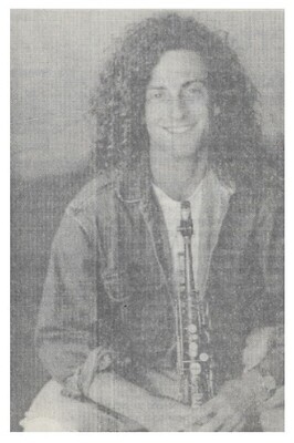 Kenny G / Smiling-Denim Jacket-Holding Saxophone / 1992