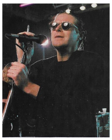 Henley, Don / 1989: On Stage-Black Shirt-Sunglasses-Cigarette