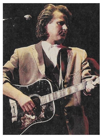Henley, Don / 1987: On Stage-Profile-Black Acoustic Guitar
