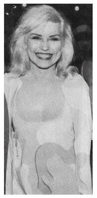 Harry, Debbie / Smiling, Low-Cut Swirl Dress (1987)