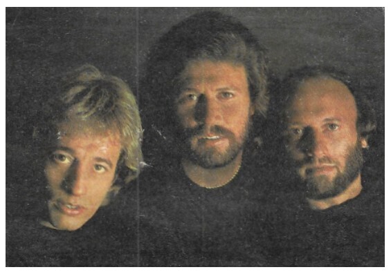 Bee Gees / 1984: Closeup-All Wearing Black-Dark Background