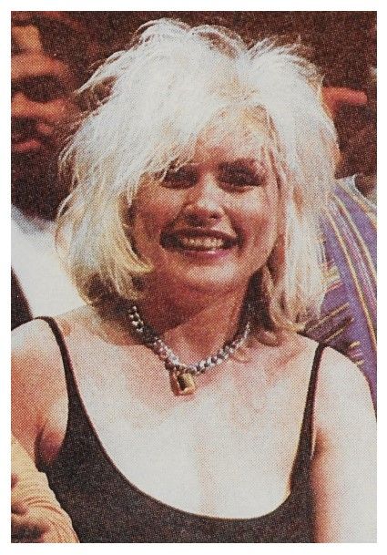 Harry, Debbie / Smiling, Low-Cut Black Dress (1980s)