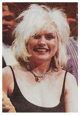 Harry, Debbie / Smiling, Low-Cut Black Dress (1980s)