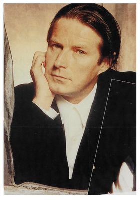 Henley, Don / Black Jacket-White Shirt-Hand on Chin (1990)