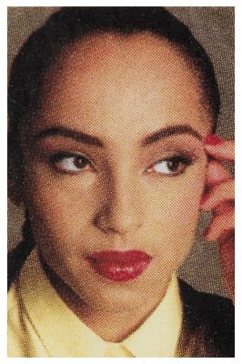Sade / Closeup-Yellow Shirt-Touching Temple