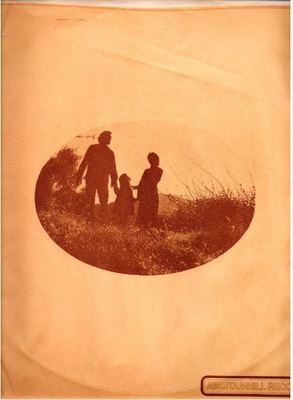 ABC-Dunhill / Oval shaped photo of man, woman, child / Orange-Brown