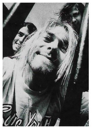 Nirvana / Group Photo-Kurt Cobain Wearing Sonic Youth Shirt (1991)
