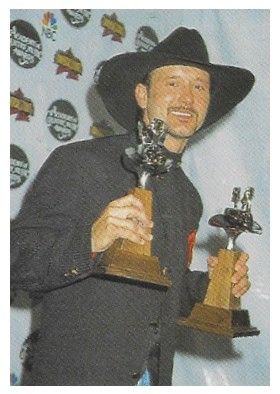 McGraw, Tim / Holding Two Academy of Country Music Awards (1995)
