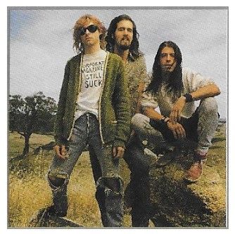 Nirvana / Group Photo-Outdoors-Kurt Cobain at Left (1992)