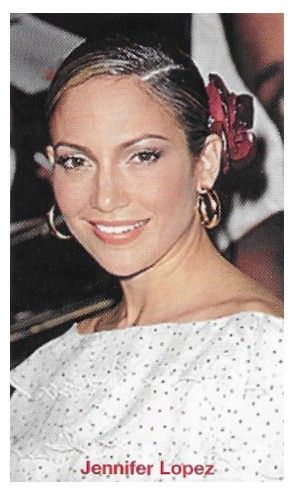Lopez, Jennifer / Closeup-White Top-Red Flower in Hair (2001)