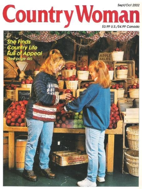 Country Woman / She Finds Country Life Full of Appeal / September-October 2002