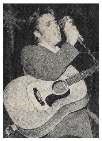 Presley, Elvis / On Stage-Florida-with Guitar and Mic. / 1956