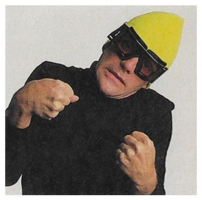 Frey, Glenn / Black Jacket-Yellow Cap-Goggles / 1988