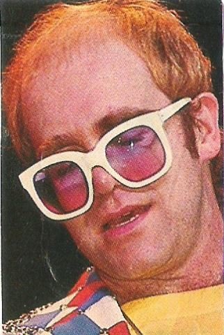 John, Elton / Closeup, On Stage, White Glasses, Red-White-Blue Jacket | Magazine Photo (1976)