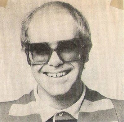 John, Elton / Closeup, Smiling, Square Glasses, Striped Shirt | Magazine Photo (1976)