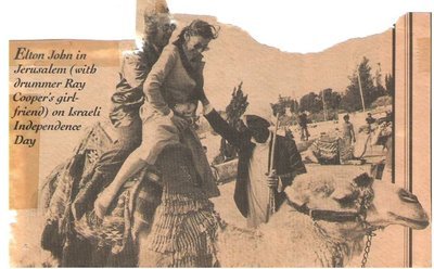 John, Elton / Riding a Camel in Jerusalem | Magazine Photo with Caption (1979)