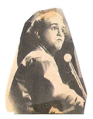 John, Elton / On Stage, No Glasses, Thin Microphone | Magazine Photo (1979)