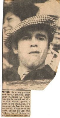 John, Elton / At Soccer Game, Checked Hat #2 | Newspaper Photo with Caption (1978)