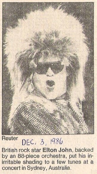 John, Elton / Backed by An 88-Piece Orchestra | Magazine Photo with Caption (1986)